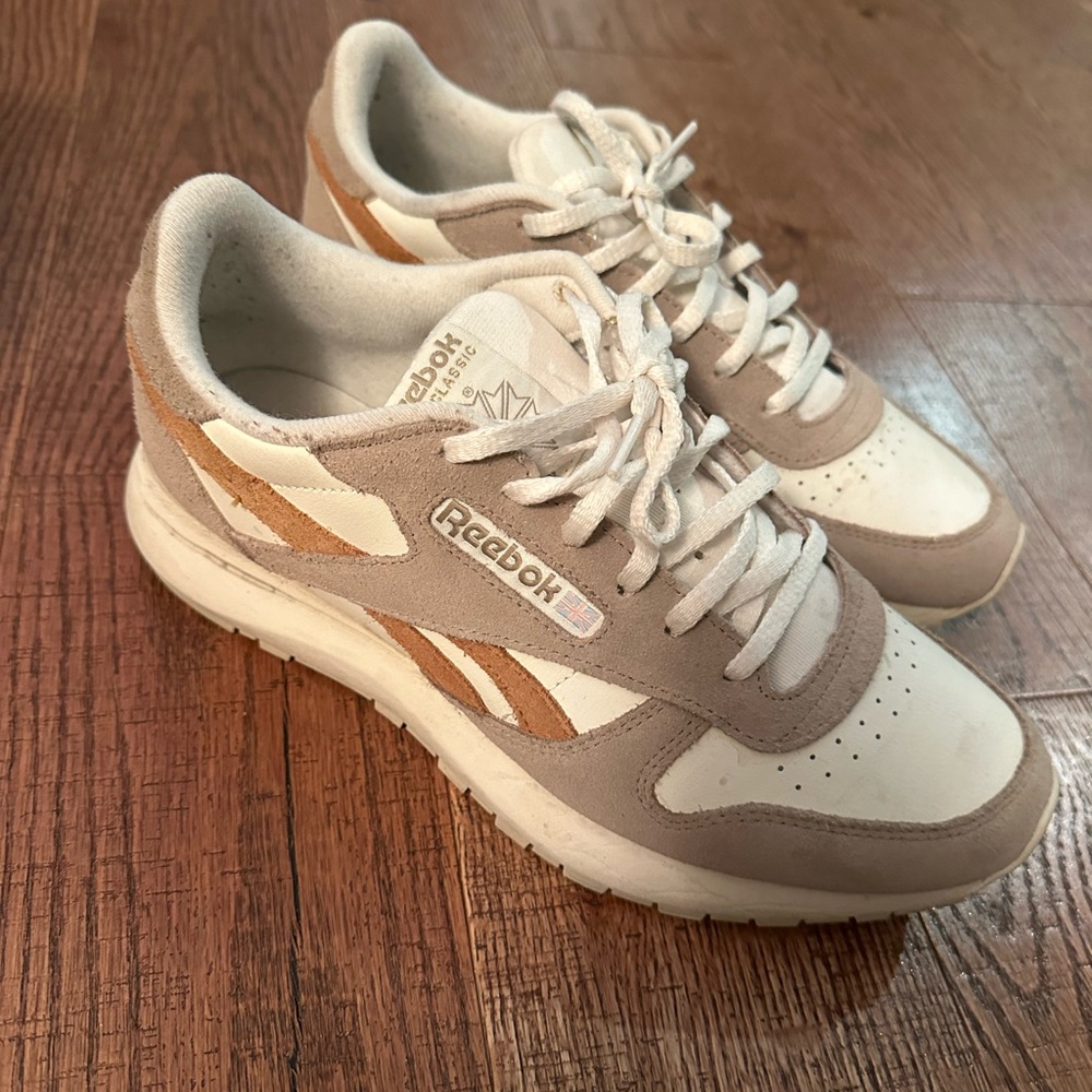 Reebok low-top sneakers in cream and tan with brown accents